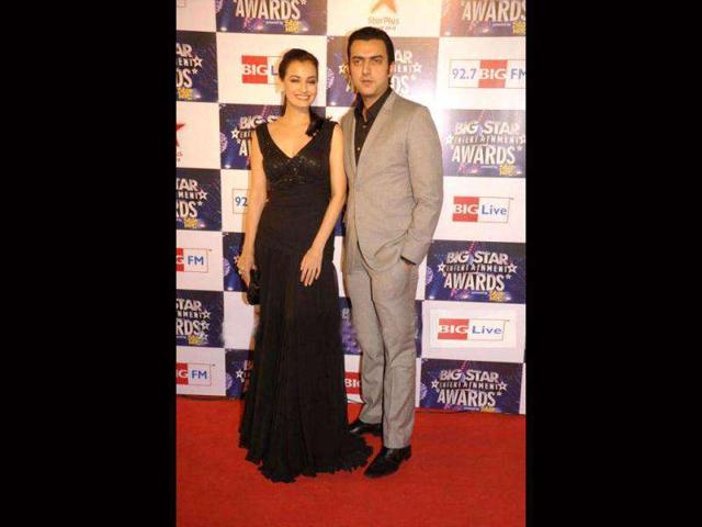 Dia Mirza poses with Sahil Singha at the red carpet.