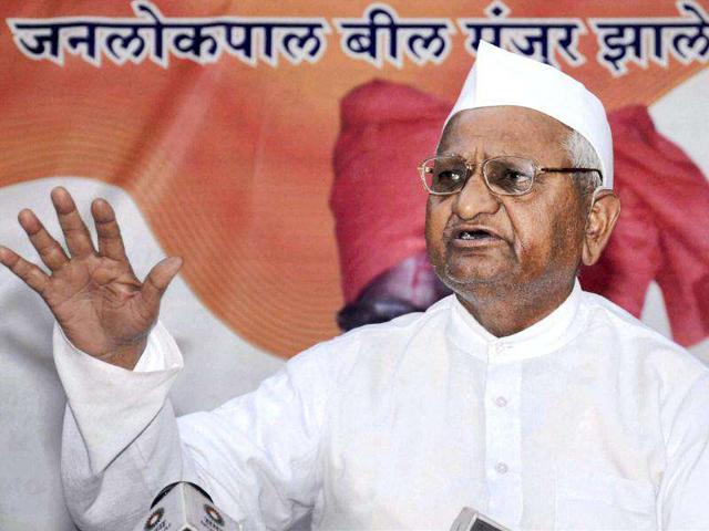 Anna Hazare addresses a press conference in Ralegan Siddhi, Ahmednagar following the introduction of Lokpal Bill in Lok Sabha. PTI Photo