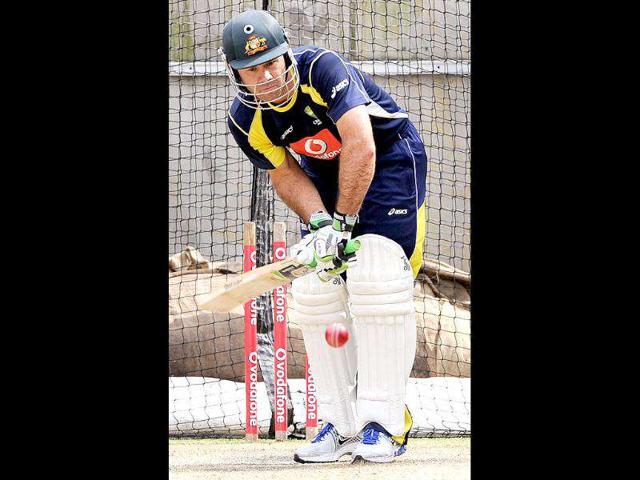 Australian batsman Ricky Ponting defends a ball as the team trains for their upcoming Test match against India at the Melbourne Cricket Ground. AFP Photo/William West