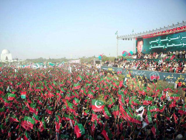 Supporters of Pakistani cricketer-turned-politician Imran Khan gather for a public meeting in Karachi. As Pakistan wrestles with a political crisis, Imran Khan is drawing ever-bigger crowds in his bid to become premier. AFP/Asif Hassan