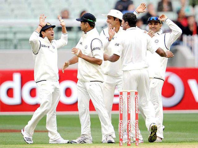 Sachin-Tendulkar-Rahul-Dravid-VVS-Laxman-and-Virender-Sehwag-congratulate-paceman-Umesh-Yadav-after-he-dismissed-Australian-batsman-David-Warner-on-the-first-day-of-the-first-Test-match-at-the-Melbourne-Cricket-Ground-MCG-in-Melbourne Sachin-Tendulkar-Rahul-Dravid-VVS-Laxman-and-Virender-Sehwag-congratulate-paceman-Umesh-Yadav-after-he-dismissed-Australian-batsman-David-Warner-on-the-first-day-of-the-first-Test-match-at-the-Melbourne-Cricket-Ground-MCG-in-Melbourne