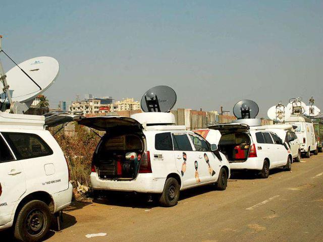 Media vans are kept ready to take live coverage of Anna's 3 days of fast at MMRDA Ground Bandra, in Mumbai.