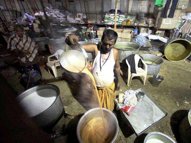 A cook prepares tea at "Anna Ki Rasoi" at MMRDA ground in Mumbai. PTI Photo