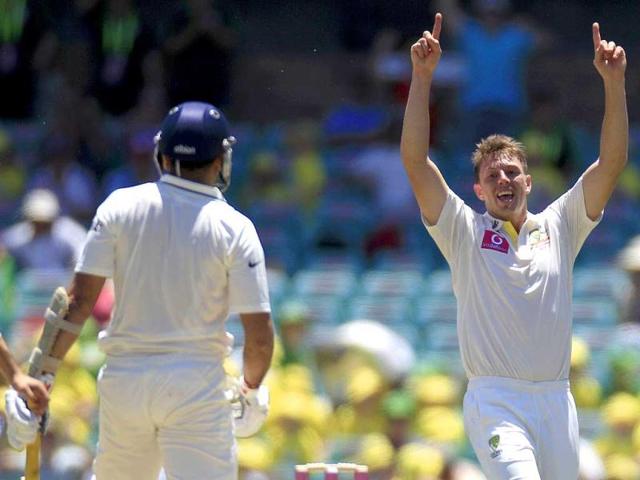 Australia's James Pattinson celebrates after taking the wicket of India's VVS Laxman for 2 runs in their cricket test match at the Sydney Cricket Ground in Sydney. AP