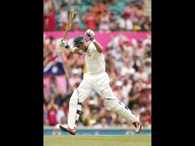 Australia's Mike Hussey celebrates reaching a century against India during the second cricket test, at the Sydney Cricket Ground. (Reuters)