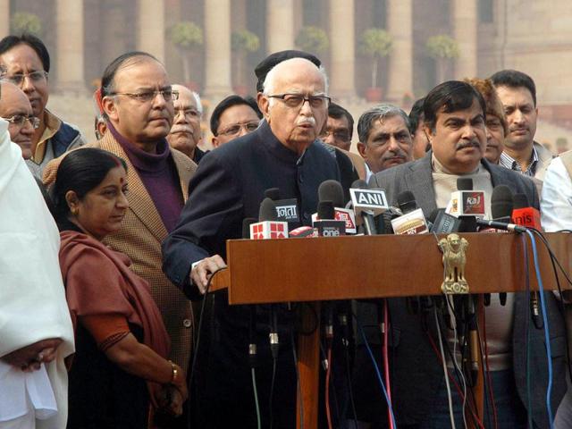 Senior BJP leader LK Advani addresses the media as BJP President Nitin Gadkari and leaders of opposition Arun Jaitley, Sushma Swaraj and other BJP leaders watch after meeting with President Pratibha Patil in New Delhi. AFP/Raveendran