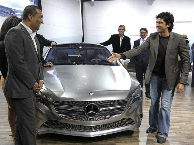 Farhan Akhtar, Irfan Pathan, Chetan Bhagat during the press preview launch of Mercedes Concept-A during the 11th Auto Expo 2012 at Pragati Maiden in New Delhi. HT Photo by Raj K Raj