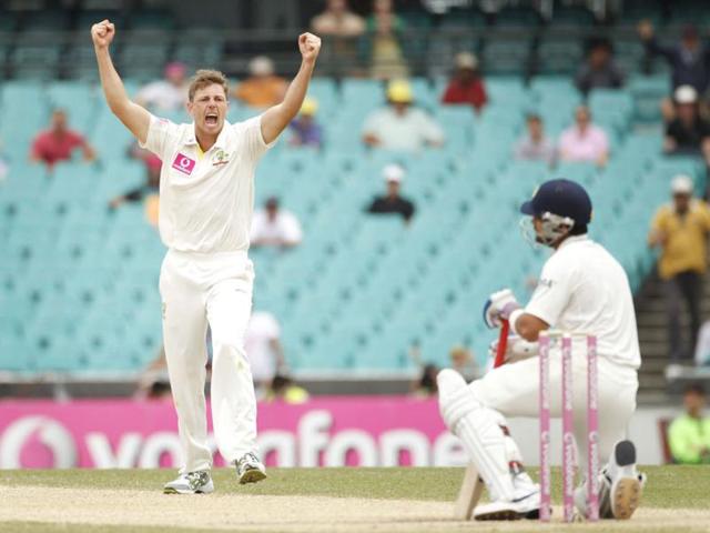 Australia's James Pattinson (L) celebrates taking the wicket of Virat Kohli (R) during the second cricket Test, at the Sydney Cricket Ground. (Reuters)