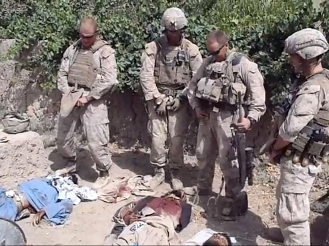 A-still-image-taken-January-11-2012-from-an-undated-YouTube-video-shows-what-is-believed-to-be-US-Marines-urinating-on-the-bodies-of-dead-Taliban-soldiers-in-Afghanistan--Reuters-YouTube A-still-image-taken-January-11-2012-from-an-undated-YouTube-video-shows-what-is-believed-to-be-US-Marines-urinating-on-the-bodies-of-dead-Taliban-soldiers-in-Afghanistan--Reuters-YouTube