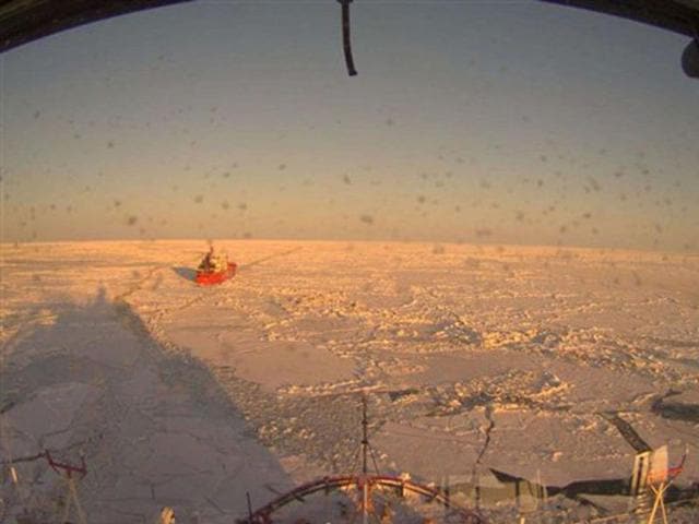 This image provided by the US Coast Guard shows the view from the Coast Guard cutter Healy as she follows the Russian tanker Renda as they make their way towards Nome. AP photo