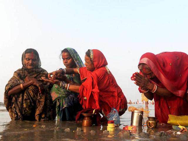 Pilgrims perform rituals at the Gangasagar some 155km south of Kolkata. Thousands of pilgrims have started to converge for the Gangasagar Mela which will culminate in a dip in the ocean at the confluence of the River Ganges and the Bay of Bengal on the occasion of Makar Sankranti. AFP photo/Dibyangshu Sarkar