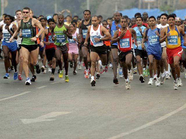 International athletes participate in the Standard Chartered Mumbai Marathon 2012, in Mumbai. AFP PHOTO/Punit Paranjpe