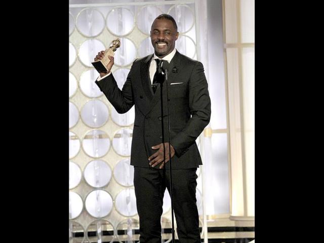 Idris-Elba-accepts-his-award-for-best-actor-Mini-Series-for-the-television-movie-Luther-during-the-69th-Golden-Globe-Awards-in-Beverly-Hills-California-Reuters Idris-Elba-accepts-his-award-for-best-actor-Mini-Series-for-the-television-movie-Luther-during-the-69th-Golden-Globe-Awards-in-Beverly-Hills-California-Reuters