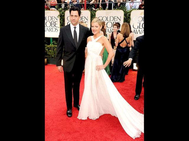 Actress Kathleen Robertson and guest arrive at the 69th Annual Golden Globe Awards held at the Beverly Hilton Hotel. (AFP)