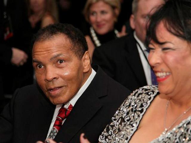 Muhammad Ali , celebrates his 70th birthday next to his sister-in-law, Marilyn Williams, at a fund raiser for the Muhammad Ali Center in his hometown of Louisville, Kentucky. (AP Photo/ The Muhammad Ali Center)