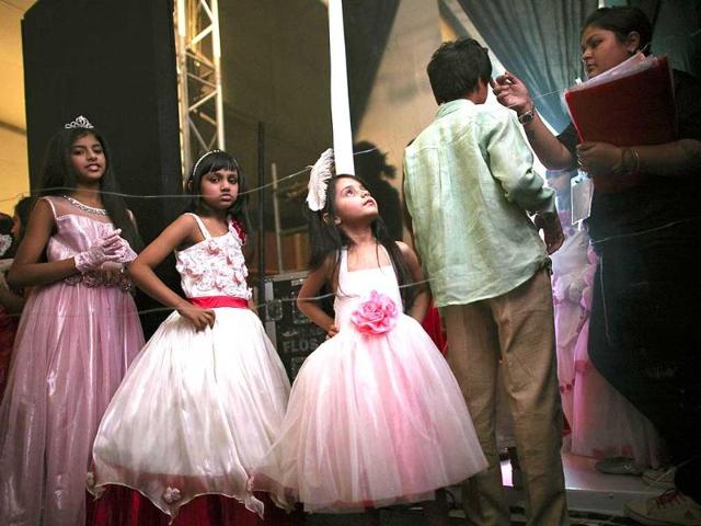 Child models wait backstage before a show at India Kids Fashion Week in Mumbai. Reuters/Danish Siddiqui.
