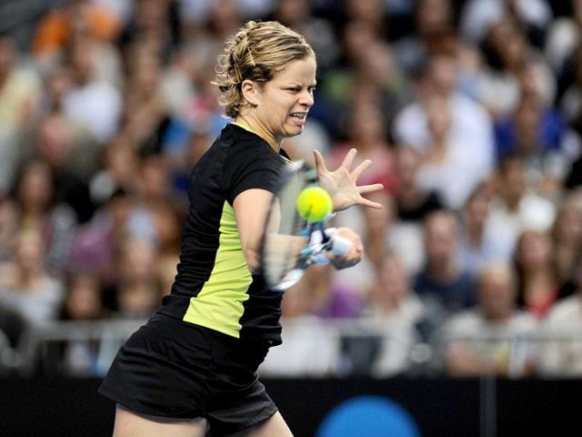 Kim Clijsters of Belgium hits a return against Daniela Nahtuchova of Slovakia in their third round women's singles match on day five of the 2012 Australian Open tennis tournament in Melbourne. (AFP Photo)