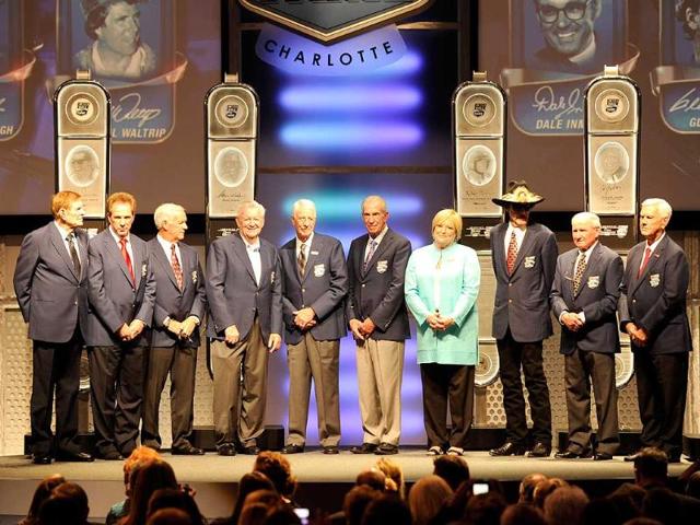Members of the NASCAR Hall of Fame stand on stage during the 2012 NASCAR Hall of Fame induction ceremony at the Charlotte Convention Center in Charlotte, North Carolina. John Harrelson/Getty Images/AFP