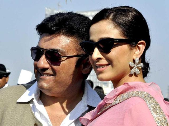 Simone Singh with husband attend the race event.