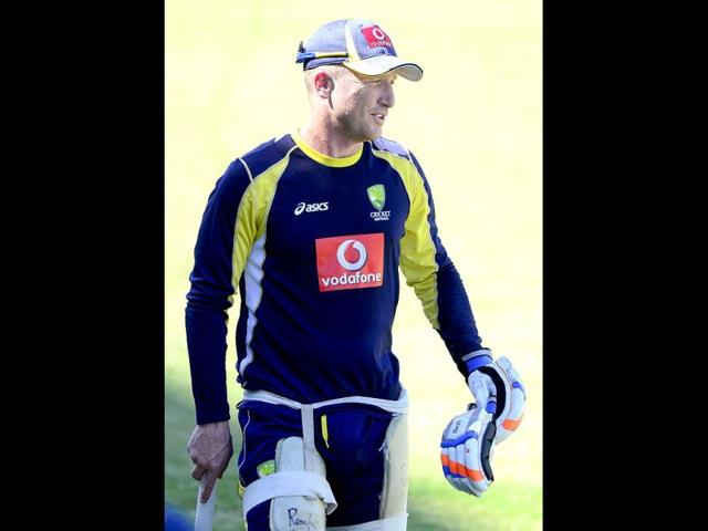 Australia's wicketkeeper Brad Haddin prepares for training at the nets before the opening day of cricket against India in Adelaide, Australia. -AP Photo/David Mariuz