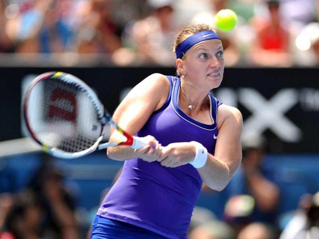 Petra Kvitova of the Czech Republic hits a return against Sara Errani of Italy in their women's singles quarter-final match on day ten of the 2012 Australian Open tennis tournament in Melbourne. AFP Photo/Nicolas Asfouri