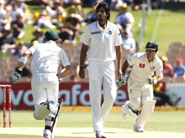 Ishant Sharma watches as Australian captain Michael Clarke and Ricky Ponting run between the wickets during the second day of the fourth Test cricket match against India in Adelaide. Reuters Photo/Brandon Malone.