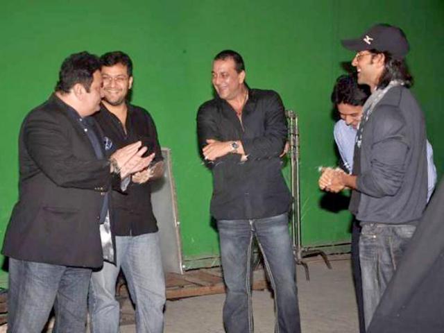 Sanjay Dutt, Hrithik Roshan, Rishi Kapoor with director Karan Malhotra. Sanjay Dutt, Hrithik Roshan, Rishi Kapoor with director Karan Malhotra.