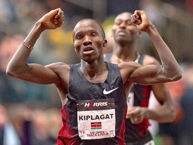 Silas Kiplagat of Kenya reacts at the finish line after beating Bernard Lagat (rear) of the US in the men's 1 mile run at the US Open Track and Field meet at Madison Square Garden in New York. Reuters