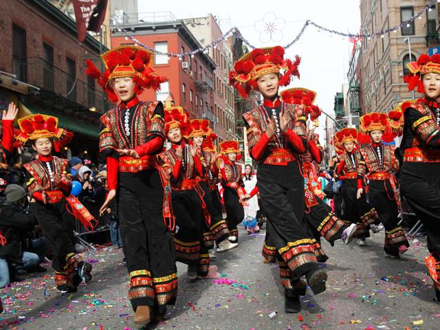 Members of a Beijing dance troupe perform during the Chinese Lunar New Year parade in Chinatown in New York, Sunday, Jan. 29, 2012. The parade marks the Year of the Dragon, which is the luckiest year on the lunar calendar. In ancient times the dragon was a symbol reserved for the Chinese emperor. (AP Photo/Kathy Willens)