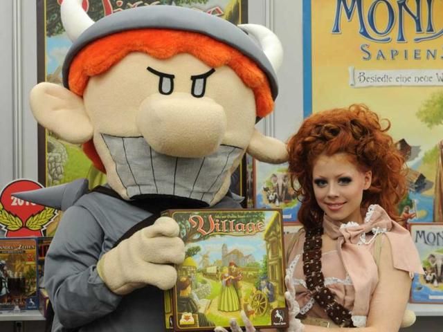 Models present the boardgame Village during the press preview of the international toy fair in Nuremberg, southern Germany. AFP