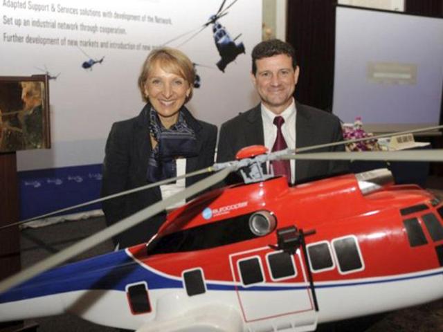 The army chose Eurocopter's AS 500 for a $550 million 197 helicopter contract in 2007. This was later scrapped due to allegations of unfair field trails from an American competitor. In this file photo, Eurocopter India CEO Marie-Agnes Veve and Executive VP, Joseph Saporito pose in front of a model of a Eurocopter helicopter at a press conference in New Delhi.