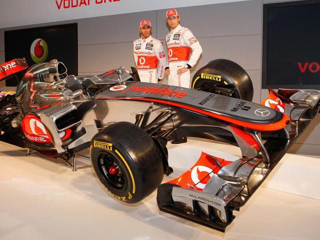 Team-McLaren-Mercedes-drivers-Lewis-Hamilton-L-and-Jenson-Button-unveil-the-new-MP-27--Formula-1-car-at-the-McLaren-technology-centre-in-Woking-England-Getty-Images Team-McLaren-Mercedes-drivers-Lewis-Hamilton-L-and-Jenson-Button-unveil-the-new-MP-27--Formula-1-car-at-the-McLaren-technology-centre-in-Woking-England-Getty-Images