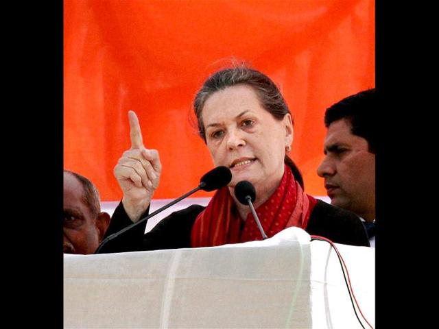 Congress President Sonia Gandhi addresses an election rally in Gonda district, Uttar Pradesh. The state goes to the polls from February 8. PTI/Nand Kumar