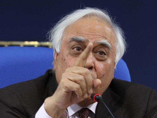 Union-minister-of-communications-and-information-technology-and-human-resources-development-Kapil-Sibal-addresses-a-press-conference-in-New-Delhi-after-the-Supreme-Court-s-verdict-on-2G-spectrum-allocation-case-HT-photo-Arvind-Yadav