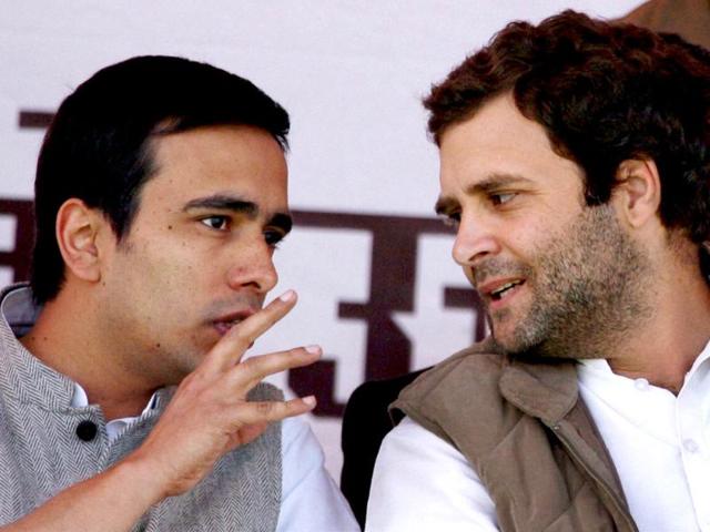 Congress-general-secretary-Rahul-Gandhi-and-Rashtriya-Lok-Dal-RLD-leader-Jayant-Chaudhary-talk-at-an-election-rally-in-Meerut-PTI-Photo