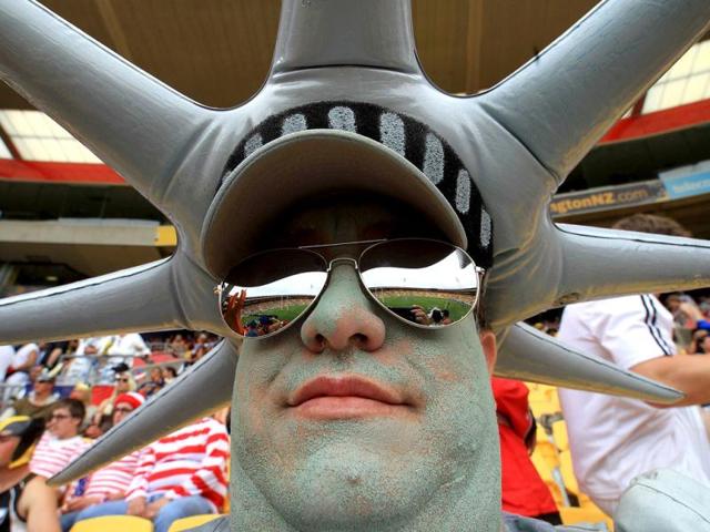 Sevens fans pose during the Rugby Sevens tournament in Wellington. AFP PHOTO /MARTY MELVILLE