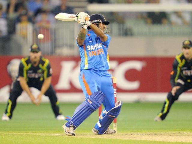 India's Gautam Gambhir swings at an Australian delivery in their international T20 cricket match at the Melbourne Cricket Ground (MCG) in Melbourne.