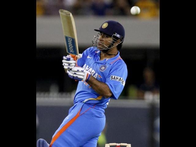 Mahendra Singh Dhoni plays a shot during their T20 International series cricket match against Australia at the Melbourne Cricket Ground in Melbourne.Reuters/Brandon Malone