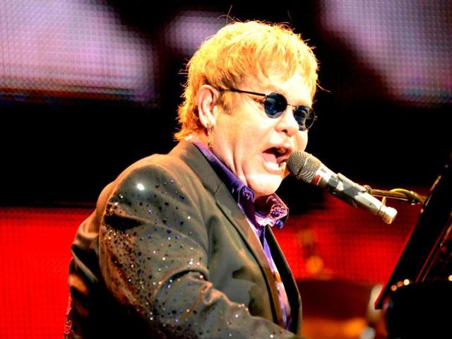 elton john singing doll