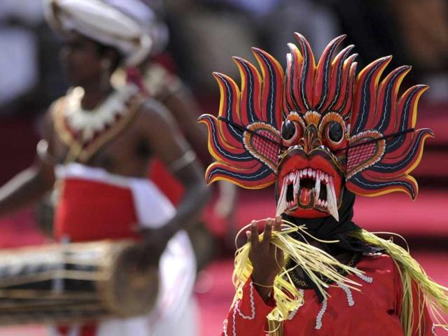 Traditional dancers perform during a ceremony to commemorate the island's 64th independence from Britain in the north central town of Anuradhapura. AFP
