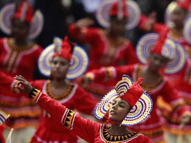 Traditional dancers perform during a parade celebrating Sri Lanka's 64th Independence Day in Anuradhapura. Reuters
