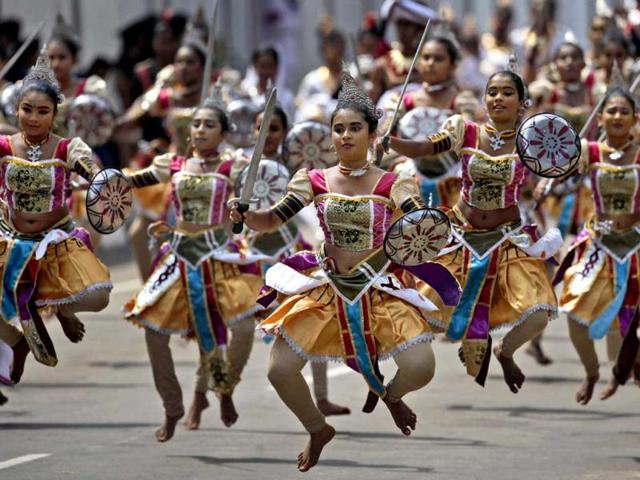 Dancers perform during a parade celebrating Sri Lanka's 64th Independence Day in Anuradhapura. AP