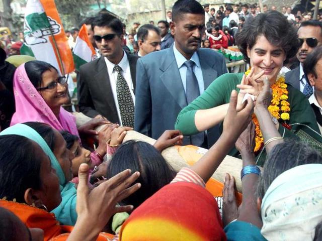 Priyanka-Gandhi-Vadra-interacts-with-women-during-her-election-campaign-in-support-of-Congress-party-at-Ashkamau-in-Amethi-PTI-Atul-Yadav