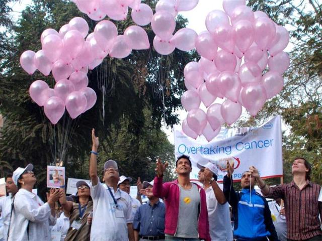 Actors Milind Soman and Rahul Bose release balloons during a walkathon organised on the occasion of World Cancer Day in Mumbai. PTI