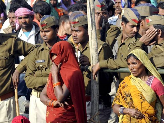 Women-and-policemen-listen-to--Bahujan-Samaj-Party-BSP-president-and-Uttar-Pradesh-chief-minister-Mayawati-during-a-rally-in-Gorakhpur-Uttar-Pradesh--AFP-PHOTO-Prakash-Singh Women-and-policemen-listen-to--Bahujan-Samaj-Party-BSP-president-and-Uttar-Pradesh-chief-minister-Mayawati-during-a-rally-in-Gorakhpur-Uttar-Pradesh--AFP-PHOTO-Prakash-Singh