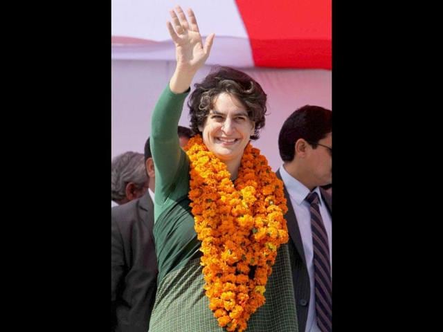 Priyanka-Gandhi-Vadra-waves-to-the-crowd-at-an-election-campaign-rally-in-support-of-Congress-party-in-Rasulpur-Amethi-PTI-Atul-Yadav