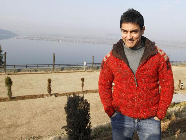 Bollywood actor Aamir Khan poses for a photograph outside his hotel in Srinagar. Khan is in the troubled state of Indian Kashmir to promote tourism.(AP)