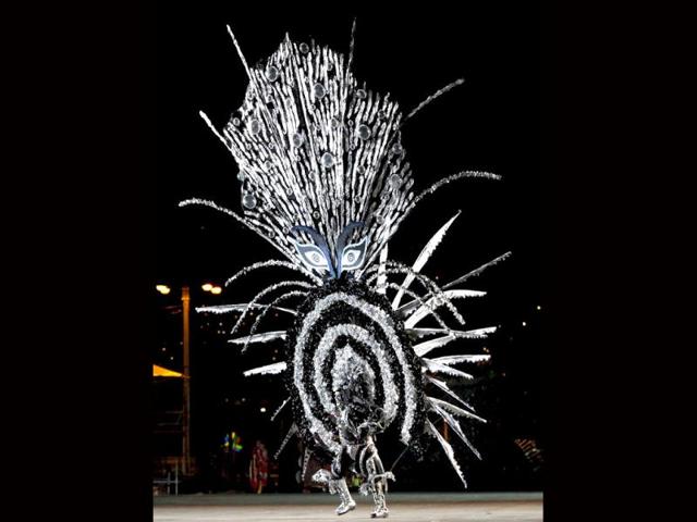 Fareid Carvalho portrays the theme titled The Keeper Of Dreams, on the stage at Queen's Park Savannah during the preliminaries of the King and Queen of Carnival competition in Port of Spain. Twenty semi-finalists were chosen from the 74 competitors from each of the king and queen categories, to go on to the next round. REUTERS/Andrea De Silva