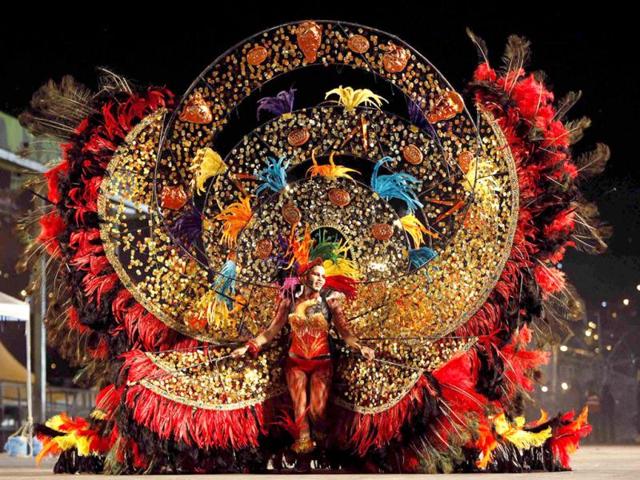 Patricia Bailey presents a creation titled Exotic Sunset on the Horizon, on the stage at Queen's Park Savannah during the preliminaries of the King and Queen of Carnival competition in Port-of-Spain. Twenty semi-finalists were chosen from the 74 competitors from each of the king and queen categories, to go on to the next round. REUTERS/Andrea De Silva