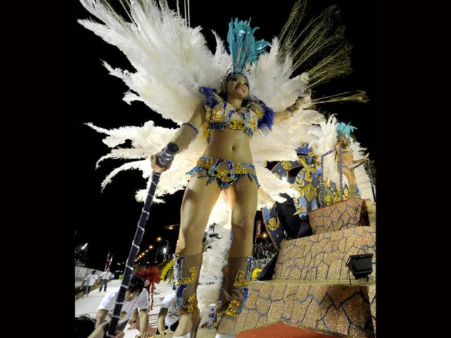 Dancers perform during carnival in Encarncion 375 km south of Asuncion. The "Llamadas" is Paraguay's biggest carnival parade, in which "comparsas," groups of dancers and drummers compete. AFP PHOTO Norberto Duarte